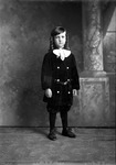 Box 23, Neg. No. 6810: Boy with Curly Hair Standing