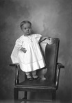 Box 23, Neg. No. 6820: Baby Standing on a Chair