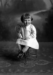 Box 25, Neg. No. 49749: Girl Sitting on a Chair