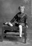 Box 25, Neg. No. 49792R: Boy Sitting on a Chair
