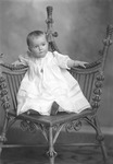 Box 26-1, Neg. No. 30908: Baby Sitting in a Chair