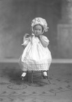 Box 26-1, Neg. No. 30985: Baby Sitting and Wearing a Bonnet