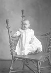 Box 26-1, Neg. No. 30951: Baby Sitting in a Chair