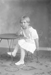 Box 26-1, Neg. No. 31096: Girl Sitting with an Elbow on a Table