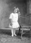 Box 26-1, Neg. No. 30196: Girl Standing Next to a Chair
