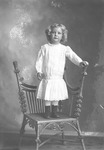 Box 26-1, Neg. No. 31099: Girl Standing on a Chair