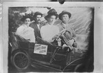 Box 26-2, Neg. No. 9058: Two Men and Two Women in a Car