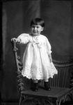 Box 26-2, Neg. No. 34057: Baby Standing on a Chair