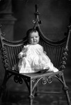 Box 26-2, Neg. No. 34095: Baby Sitting on a Chair