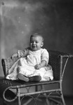 Box 26-3, Neg. No. 35054: Baby Sitting on a Chair
