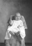 Box 27, Neg. No. 39202: Baby Sitting in a Chair