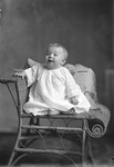 Box 27, Neg. No. 39223: Baby Sitting in a Chair
