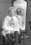 Box 28, Neg. No. 39297: Boy Sitting Next to a Mirror
