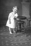 Box 28, Neg. No. 39695: Baby with Elbow on a Stool