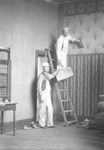 Box 28, Neg. No. 39608: Two Men Hanging Wallpaper