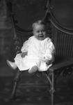 Box 29, Neg. No. 40252: Baby Sitting in a Chair