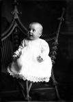 Box 29, Neg. No. 40357: Baby in a Chair