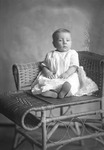 Box 30, Neg. No. 40586: Baby Sitting in a Chair