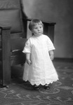 Box 30, Neg. No. 40146: Baby Standing Next to a Chair