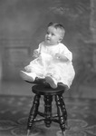 Box 30, Neg. No. 40080: Baby Sitting on a Stool