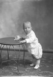 Box 30, Neg. No. 40988: Baby Standing Next to a Table