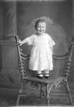 Box 31, Neg. No. 49169: Baby Standing on a Chair