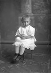 Box 31, Neg. No. 49325: Girl Sitting on a Chair