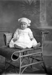 Box 32, Neg. No. 49236: Baby in a Chair