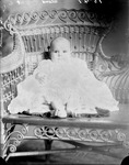 Box 32-2, Neg. No. 1547: Baby Sitting in a Chair