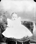 Box 32-2, Neg. No. 1675: Baby Sitting on a Chair