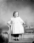 Box 34, Neg. No. 10M: Child Standing on a Chair