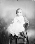 Box 34, Neg. No. 6226A: Baby Sitting on a Chair