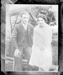 Box 35, Neg. No. 52437: Photograph of a Man and Woman Sitting Outdoors