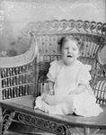 Box 35, Neg. No. 06532: Baby Sitting on a Chair