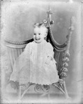 Box 36, Neg. No. 39127R: Baby Sitting on a Chair