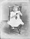 Box 36, Neg. No. 39192: Girl Sitting on a Rocking Chair