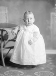 Box 36, Neg. No. 39351: Baby Standing Next to a Chair