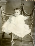 Box 37, Neg. No. 1986-44-5328: Baby Sitting on a Chair