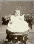 Box 38, Neg. No. 514: Baby Sitting in a Chair