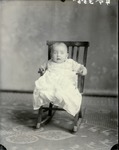 Box 38, Neg. No. 49355: Baby in a Rocking Chair