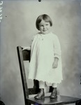 Box 39, Neg. No. 37075: Girl Standing on a Chair