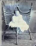 Box 39, Neg. No. 49830: Baby Sitting on a Chair