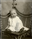 Box 39, Neg. No. 49960: Baby Sitting on a Chair