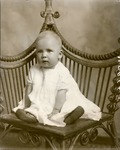 Box 39, Neg. No. 49960: Baby Sitting on a Chair