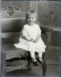 Box 40, Neg. No. 52852: Girl Sitting on a Chair