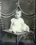 Box 40, Neg. No. 52861R: Girl Sitting on a Chair