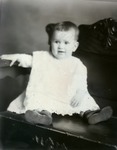Box 40, Neg. No. 53468R:  Baby Sitting on a Chair