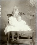 Box 41, Neg. No. 53296: Girl and Baby Sitting