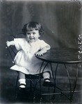 Box 41, Neg. No. 53252: Girl Sitting on a Chair