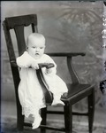 Box 41, Neg. No. 53263:  Baby Sitting on a Chair